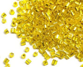 Yellow transparent with silver-plated center, Czech cut
