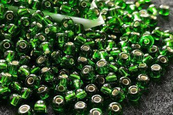 Transparent green with silver-plated center large, Czech beads