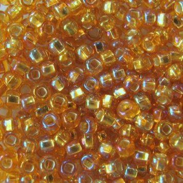 Amber rainbow with silver plated center, Czech beads