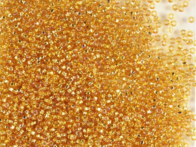 Amber rainbow with silver plated center, Czech beads