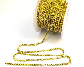 Rhinestone chain citrine in a frame in the color of the rhinestones dense (2 mm)