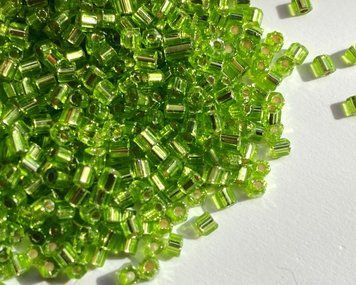 Light green transparent with silver-plated center, Czech cut