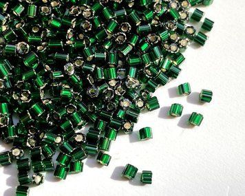 Green dark transparent with silvered center, Czech cut