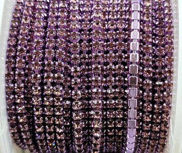 Light amethyst rhinestone chain in a frame in the color of the rhinestones (2 mm)