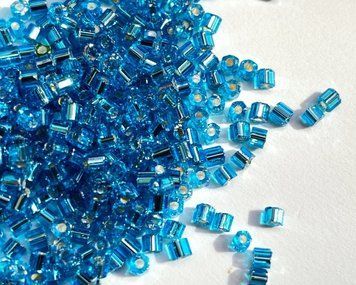 Blue transparent with silver-plated center, Czech cut