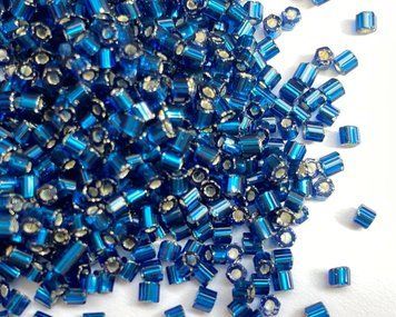 Blue transparent with silver-plated center, Czech cut